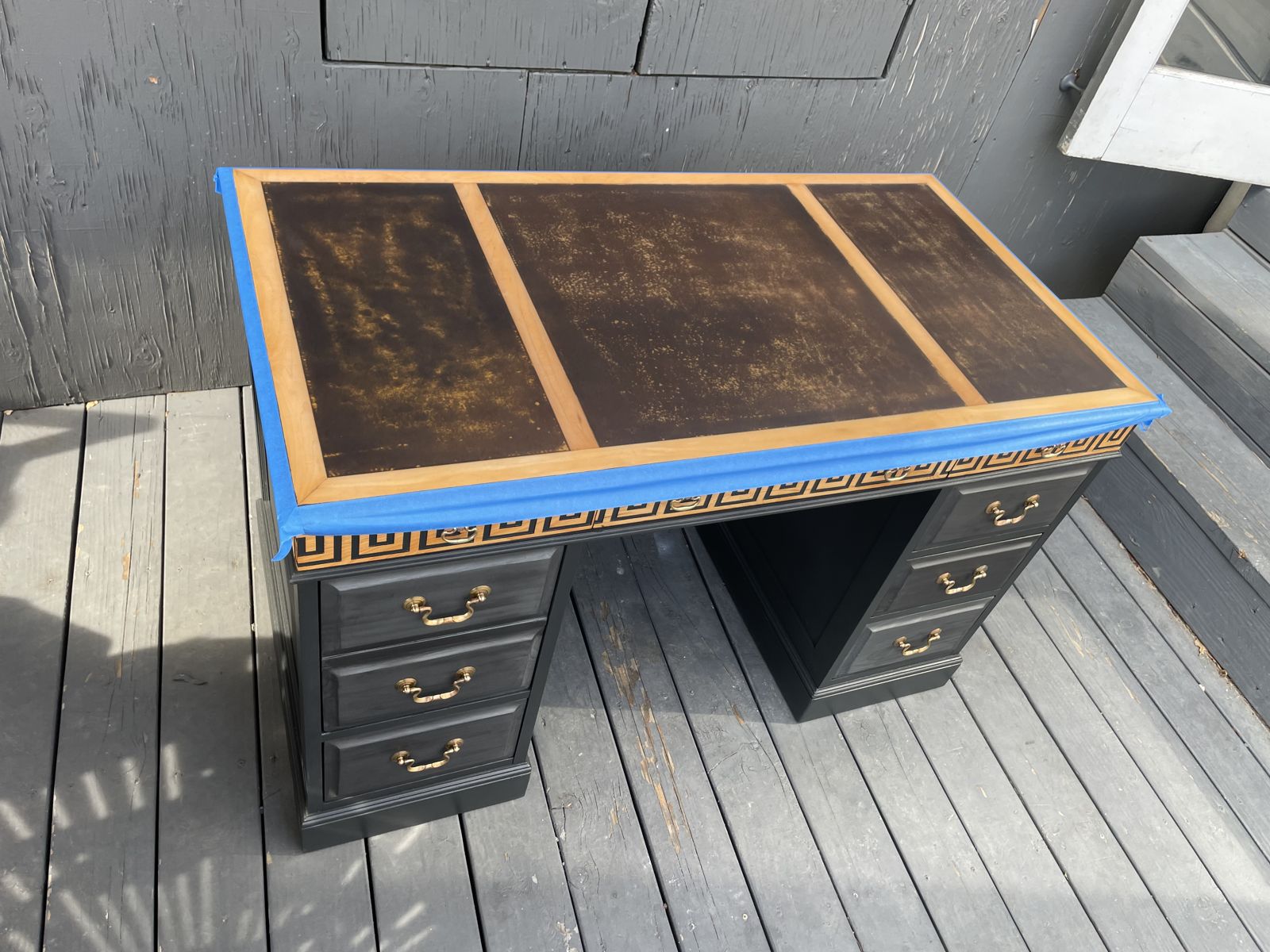 Desk top masked off during finishing