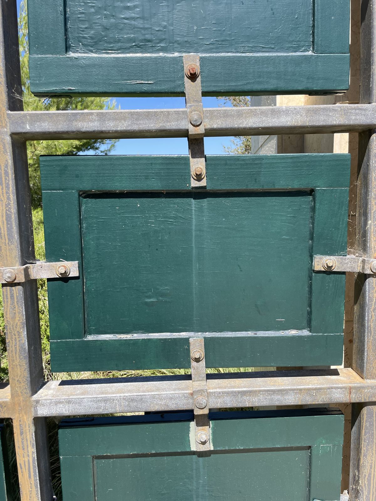 Doors stripped of old paint and racked for sanding