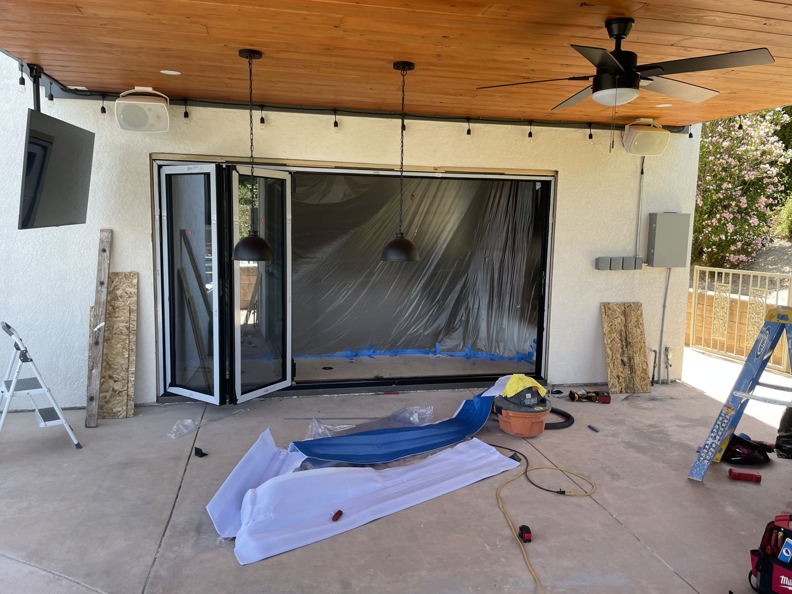 Folding glass doors installed and protected