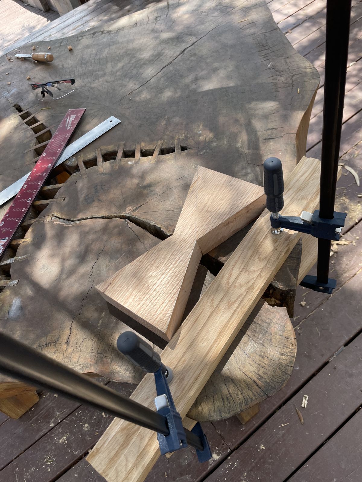 Butterfly key being clamped and fitted into the slab